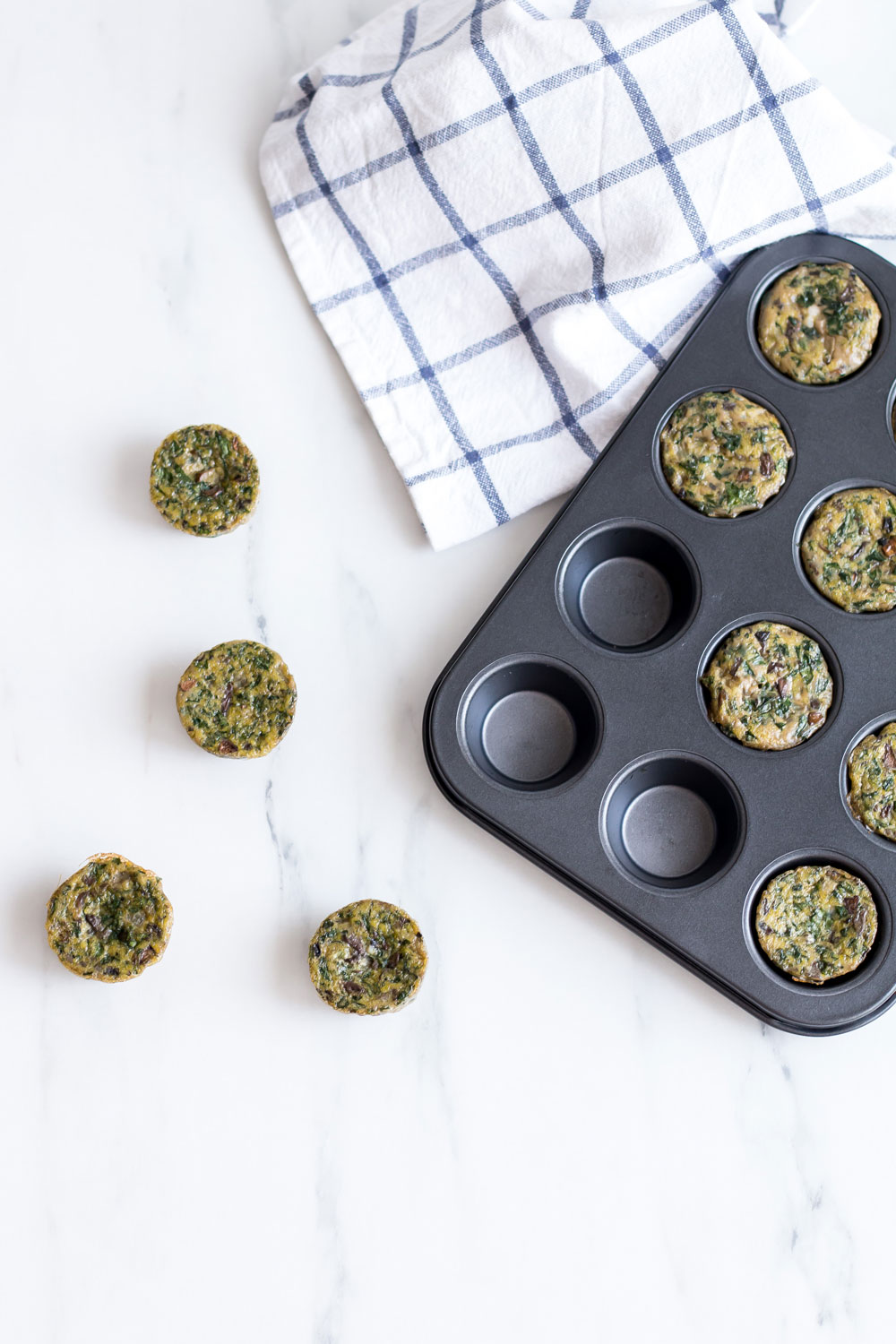 Clean Green Veggie Egg Muffins Recipe: Gluten-free, low-carb and only 35 calories each! https://www.spotebi.com/recipes/clean-green-veggie-egg-muffins/