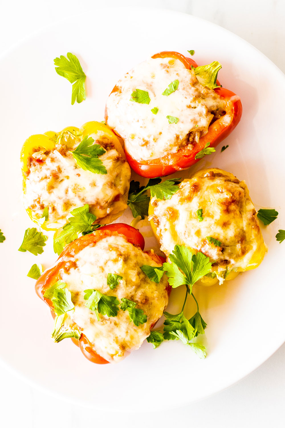 These Creamy Cheddar, Rice and Beef Stuffed Peppers are one of those feel-good meals that are perfect for weeknight dinners! https://www.spotebi.com/recipes/creamy-cheddar-rice-beef-stuffed-peppers/