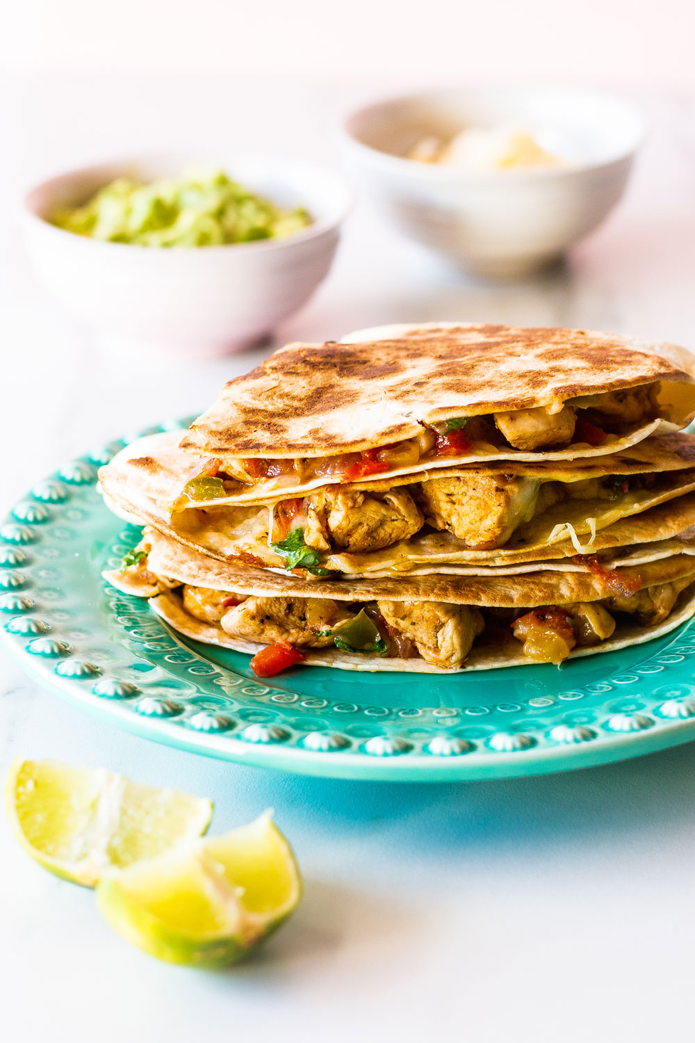 Quesadillas are a crowd favorite, and this easy chicken quesadilla recipe is a quick, filling, delicious meal that you can make for lunch, dinner, or breakfast in under 30 minutes. https://www.spotebi.com/recipes/easy-chicken-quesadilla-recipe/