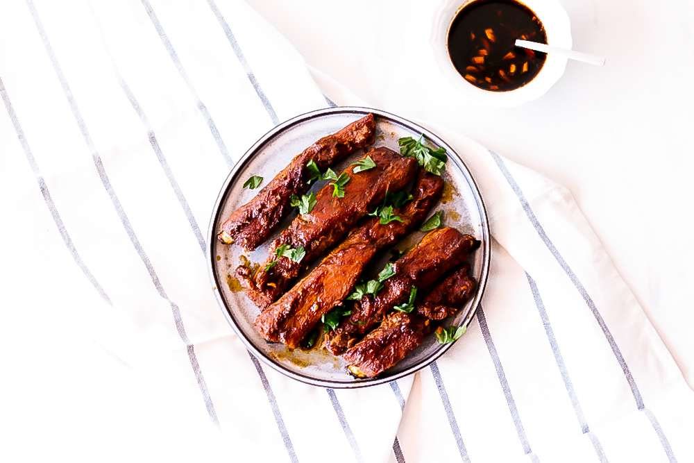 If you're trying to reduce bloating, cooking yourself a high-protein, low-carb dinner, like these oven-baked ribs, can do wonders for your figure! https://www.spotebi.com/recipes/easy-melt-in-your-mouth-oven-baked-ribs/