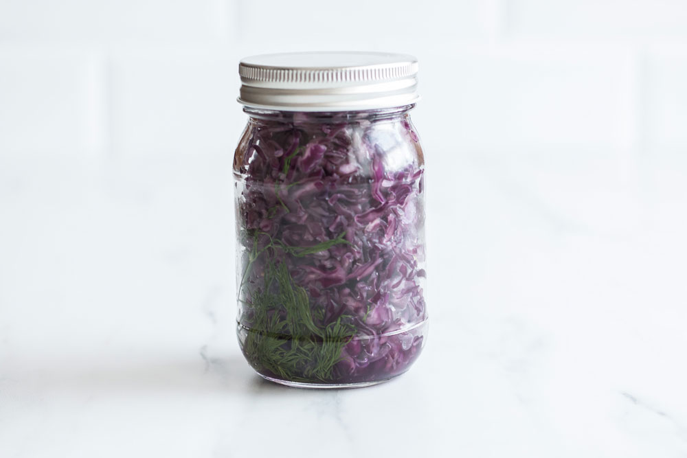 Purple Cabbage Sauerkraut Recipe: A naturally fermented functional food to help reduce bloating and boost immunity! https://www.spotebi.com/recipes/fermented-purple-sauerkraut/