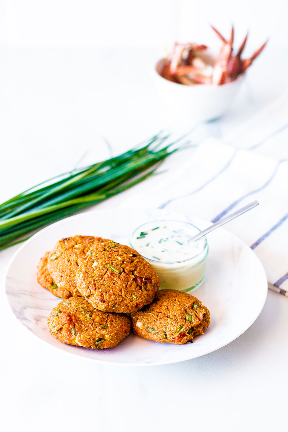These Light & Simple Baked Crab Cakes are made with simple, wholesome ingredients, are low in fat, and each cake only contains around 50 calories. https://www.spotebi.com/recipes/light-simple-baked-crab-cakes/