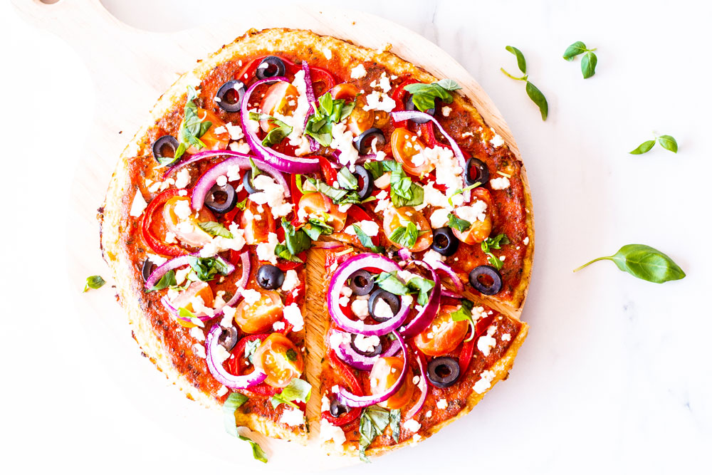 If you enjoy pizza night but are trying to cut down calories or reduce your carb intake, you can replace traditional pizza crust with this cauliflower pizza crust, instead! https://www.spotebi.com/recipes/mediterranean-pizza-cauliflower-crust/
