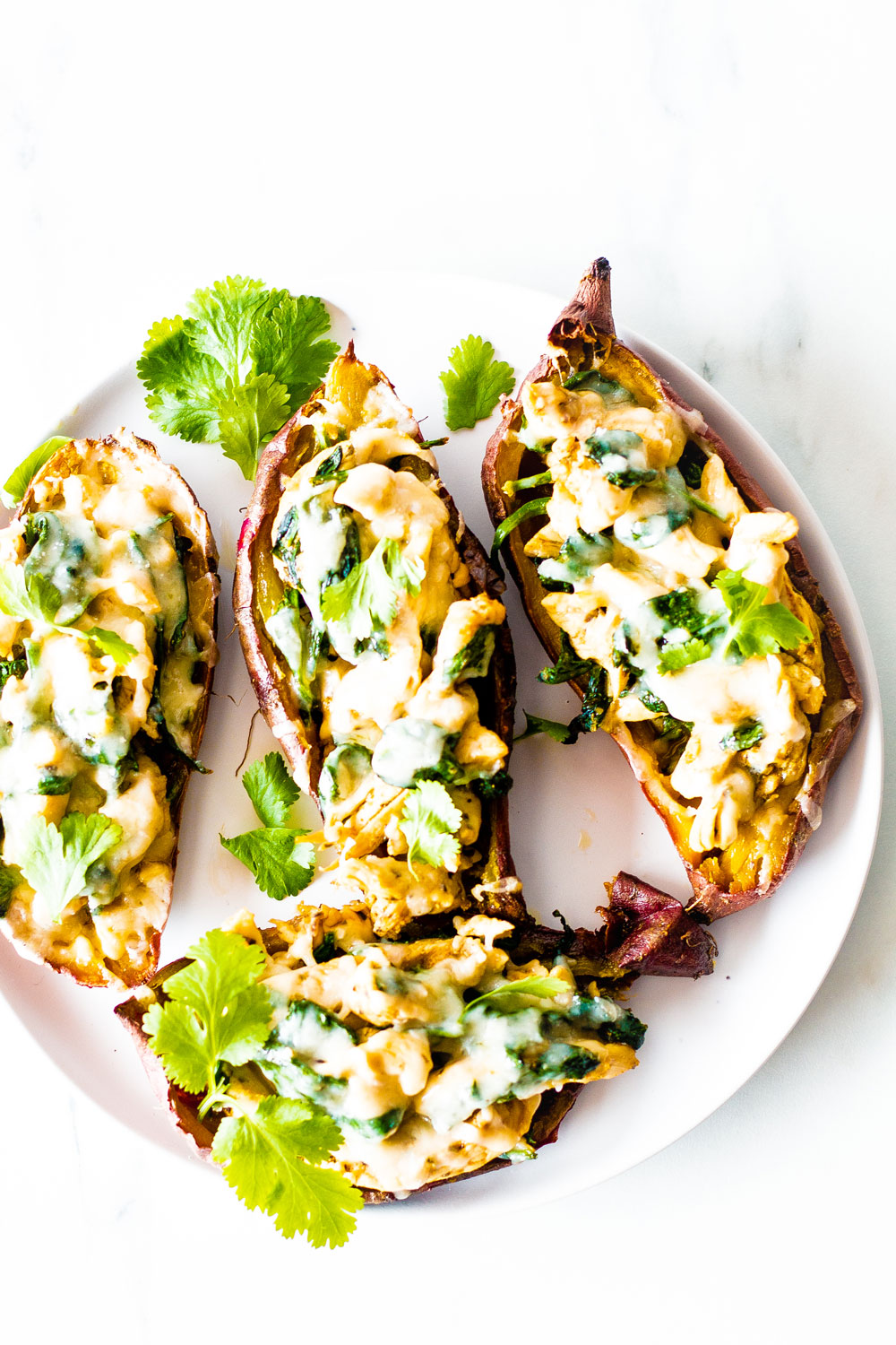 This easy and cheesy turkey stuffed sweet potato skins recipe uses up leftover meat and veggies from all the winter festivities. https://www.spotebi.com/recipes/cheesy-turkey-stuffed-sweet-potato-skins/