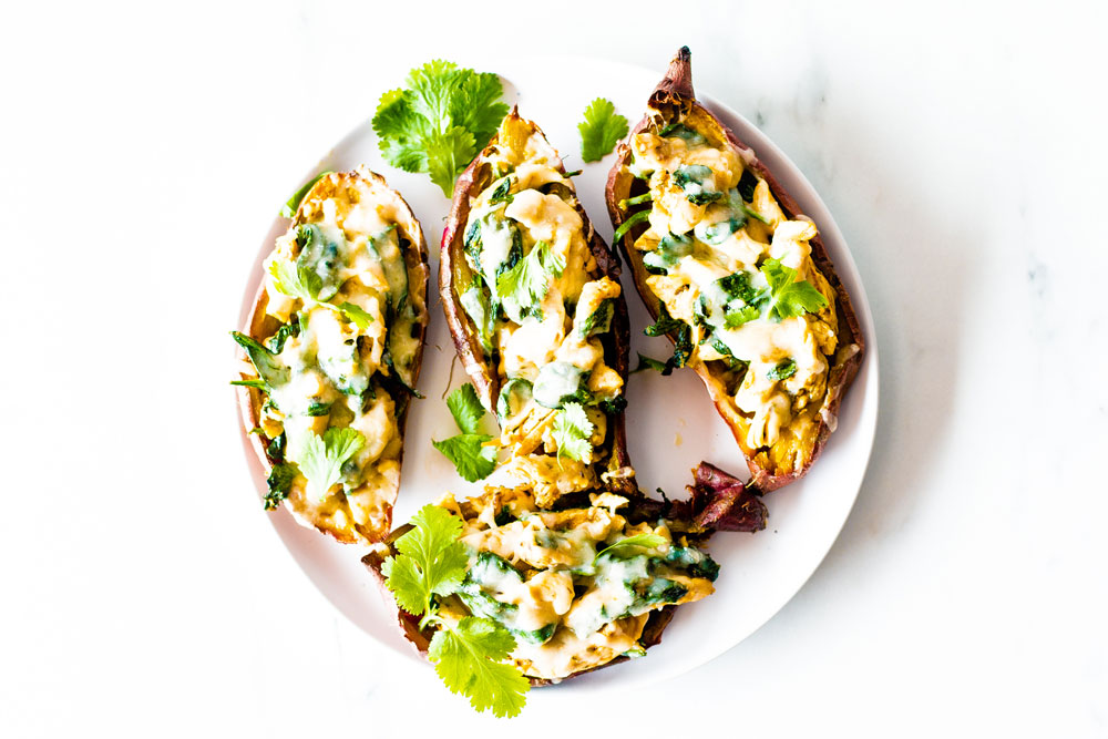This easy and cheesy turkey stuffed sweet potato skins recipe uses up leftover meat and veggies from all the winter festivities. https://www.spotebi.com/recipes/cheesy-turkey-stuffed-sweet-potato-skins/