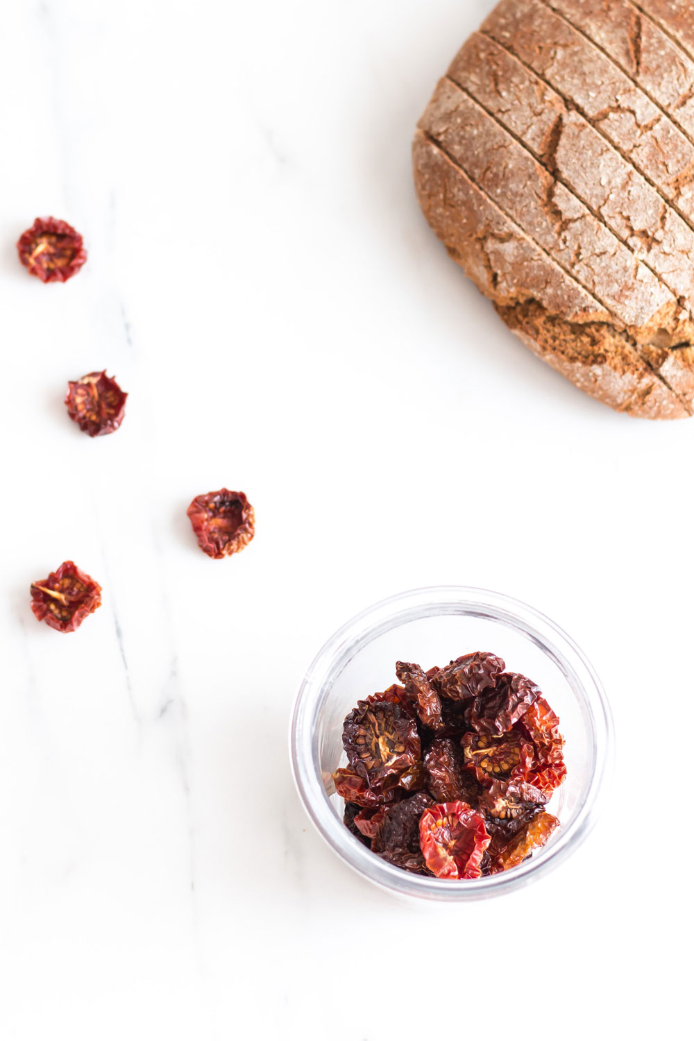 Oven-Dried Tomatoes Recipe: Intensely flavored and nutrient-packed to add depth and a summery taste to your salads, sandwiches, dressings and pasta dishes! https://www.spotebi.com/recipes/oven-dried-tomatoes/