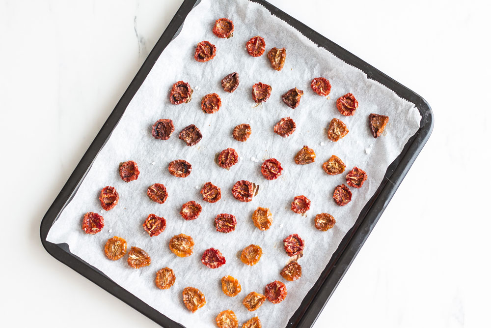 Oven-Dried Tomatoes Recipe: Intensely flavored and nutrient-packed to add depth and a summery taste to your salads, sandwiches, dressings and pasta dishes! https://www.spotebi.com/recipes/oven-dried-tomatoes/