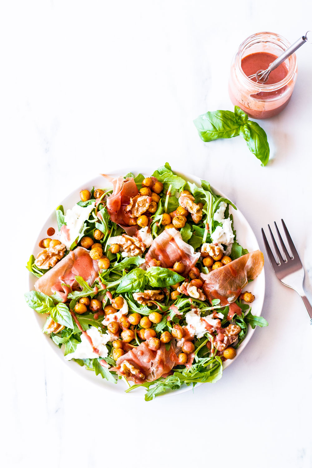For a festive end-of-summer salad, try this prosciutto, mozzarella, and spicy chickpea salad with strawberry vinaigrette. This recipe is loaded with good quality Italian prosciutto and served with a fragrant sweet and sour salad dressing. https://www.spotebi.com/recipes/prosciutto-mozzarella-spicy-chickpea-salad-strawberry-vinaigrette/
