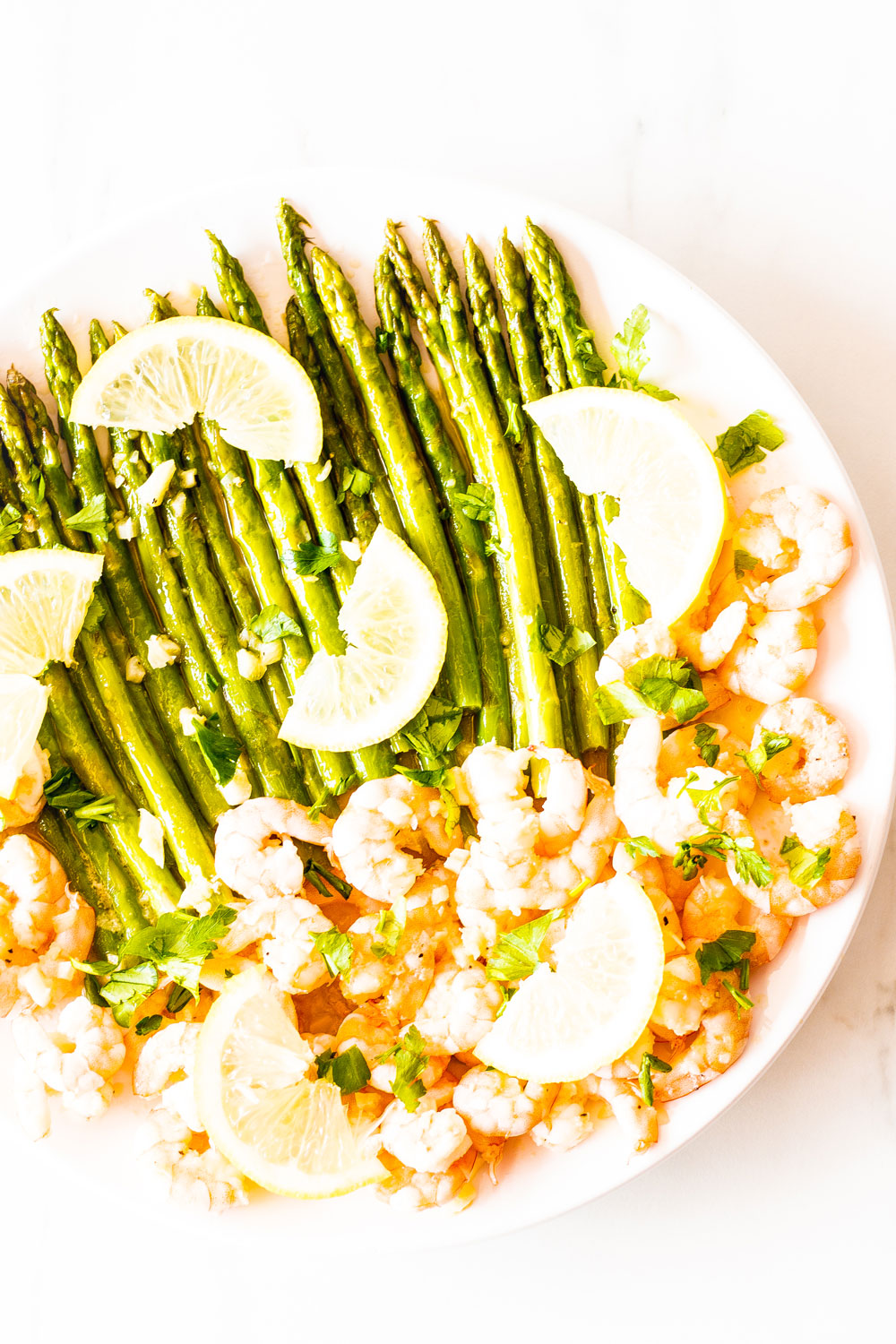 This Sauteed Garlic Shrimp with Asparagus recipe is perfect for a healthy, quick, and delicious dinner! It's packed with vitamins, minerals, protein, and fiber, and it's going to become your new favorite seafood dish! https://www.spotebi.com/recipes/sauteed-garlic-shrimp-asparagus/
